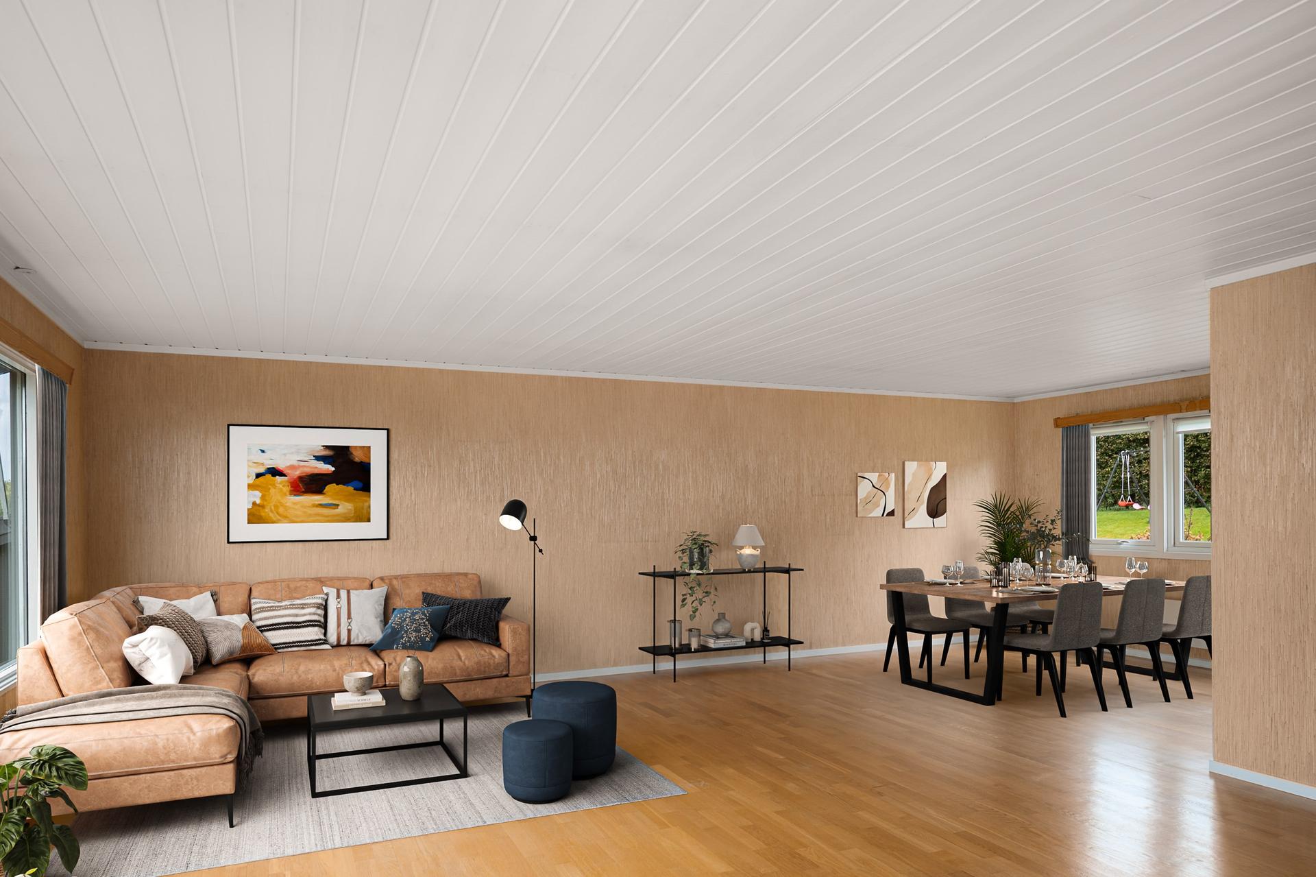 Stuen har god plass til både sofagruppe og spisebord (Bildet er digitalt stylet). . Bilde nummer 3 av 3