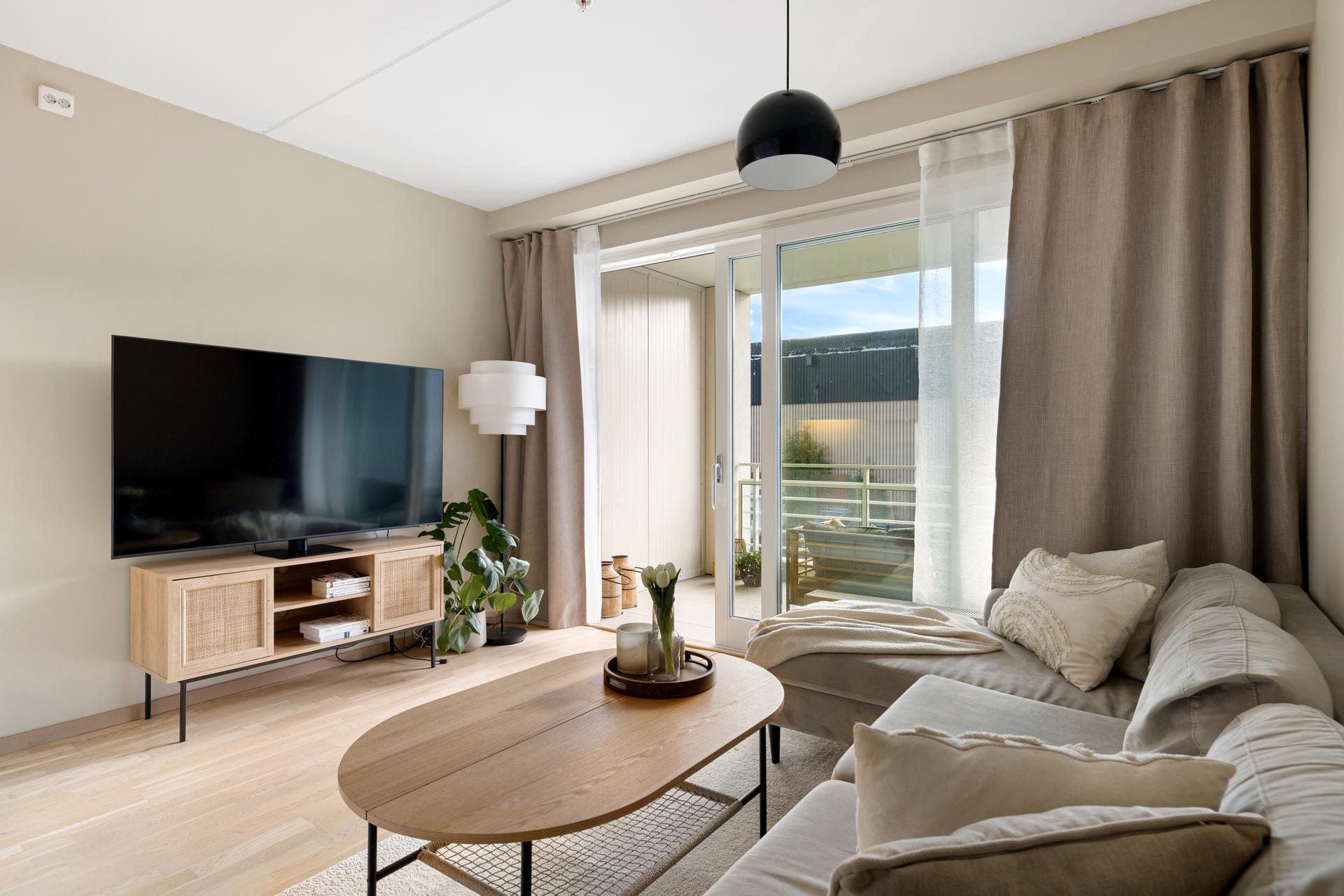 EiendomsMegler 1 v/ Mads Larsen har gleden av å ønske velkommen til Julianus Holms veg 26 - En flott og moderne 2-roms selveierleilighet med en attraktiv og sentral beliggenhet på Lade (Foto: Julian Nonstad - Nonstad foto).. Bilde nummer 1 av 3