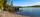 Den private strandparselen har sandstrand. Den private bøyen med moring på 3,5 tonn ses til høyre.. Bilde nummer 2 av 3