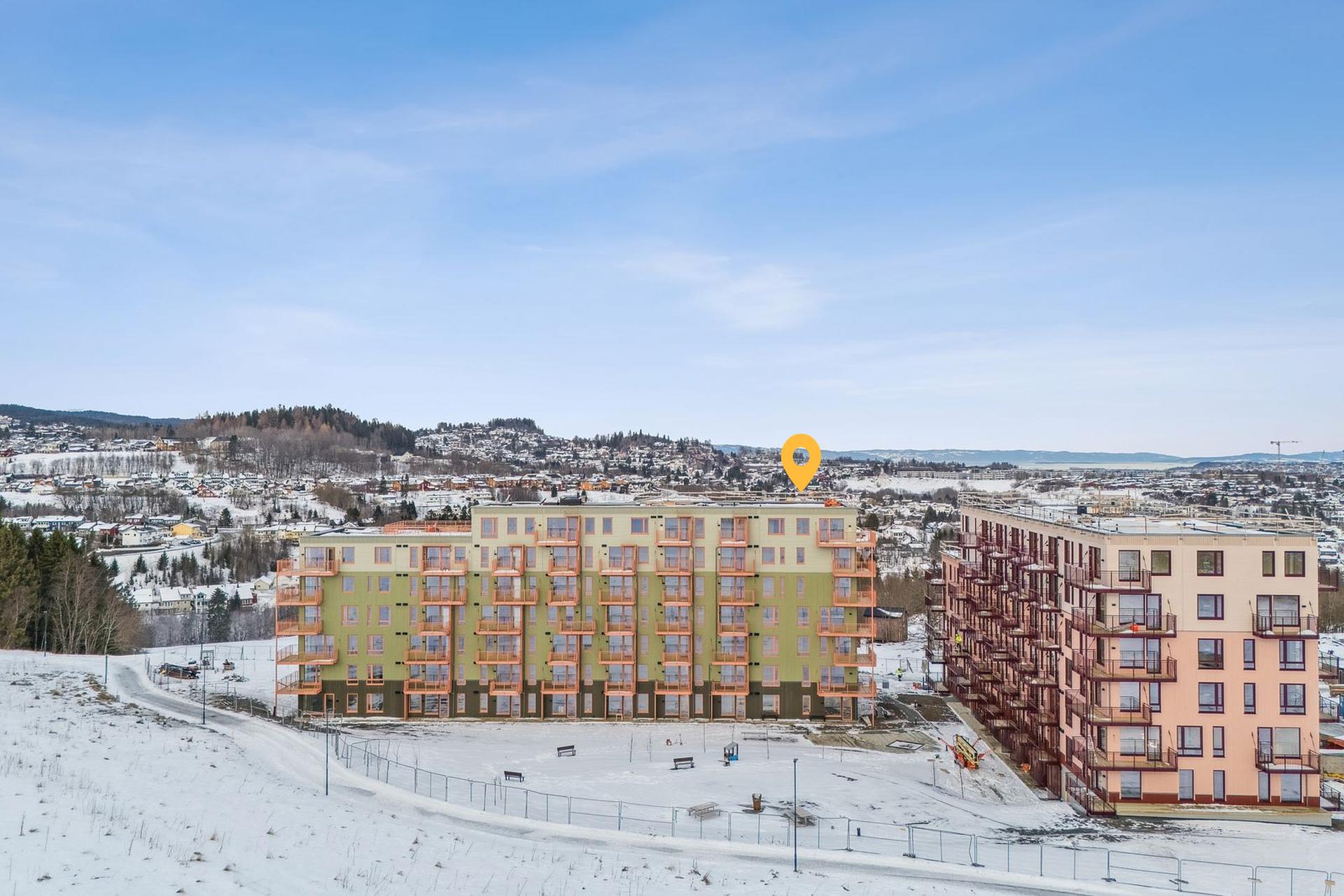 Leilighet B703 ligger utmerket til å toppen og hjørne av bygget. . Bilde nummer 2 av 3