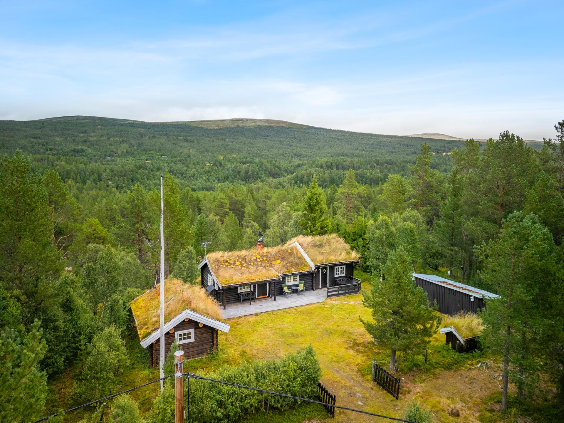Her presenteres en flott og innholdsrik fritidseiendom, med skjermet beliggenhet ved Høen, i Os kommune.. Bilde nummer 2 av 3