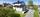 Eiendommen har en dobbelgarasje fra ca. 1982 og en oppgruset adkomst med parkering.. Bilde nummer 3 av 3