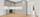 Leiligheten fra 2022 har vannbåren gulvvarme og en åpen stue- og kjøkkenløsning.. Bilde nummer 2 av 3