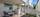 Boligen har flere fine uteplasser for avslapping og lek, bl.a. denne delvis overbygde terrassen på ca. 20 m² ved inngangspartiet.. Bilde nummer 3 av 3