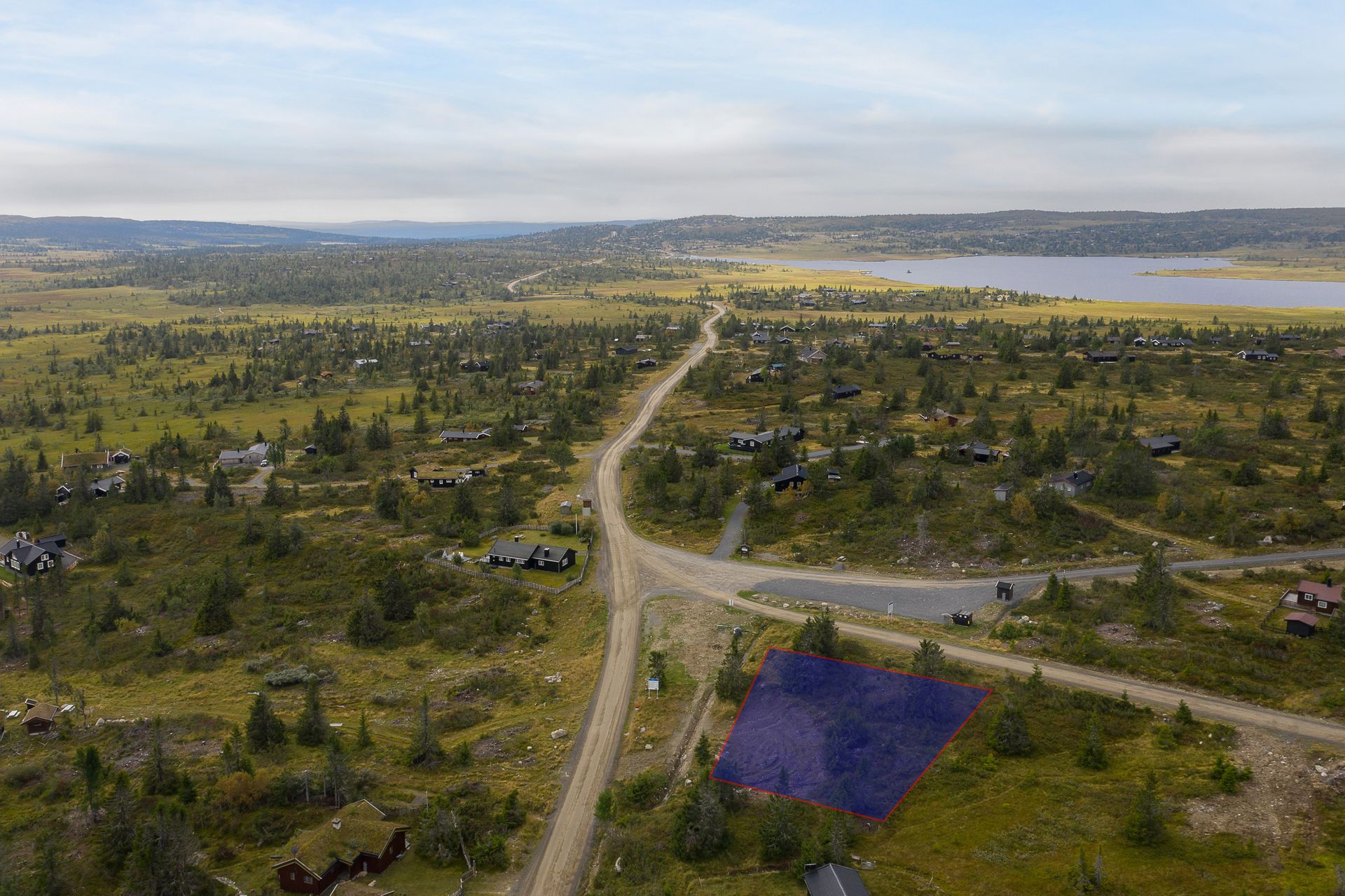 Den tidligere bomvokterhytta er revet og det er nå klargjort for bygging, midt i knutepunktet på Elågsen.. Bilde nummer 2 av 3