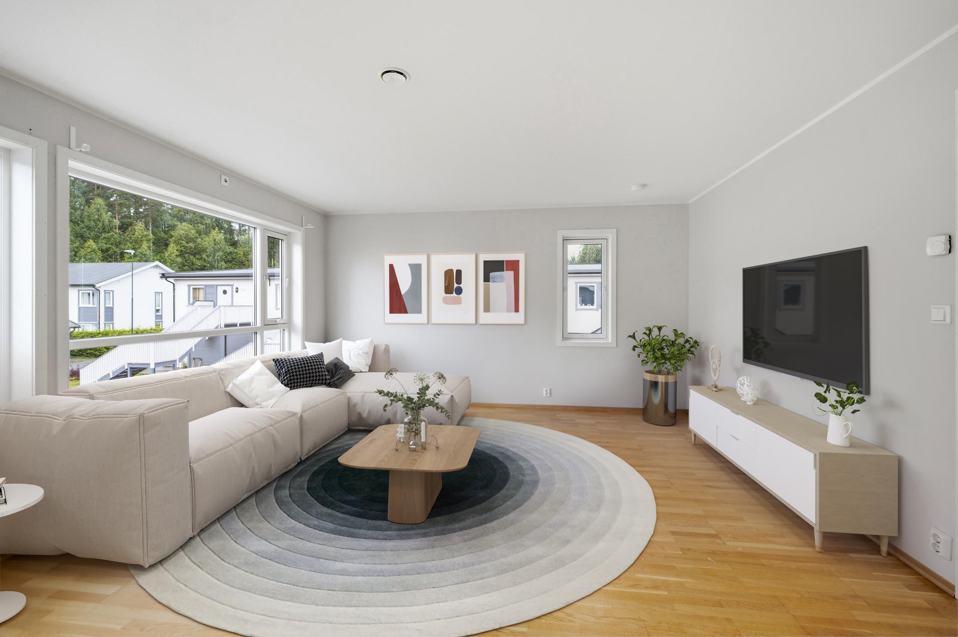 Stuen har god plass til både sofagruppe og spisebord.. Bilde nummer 3 av 3