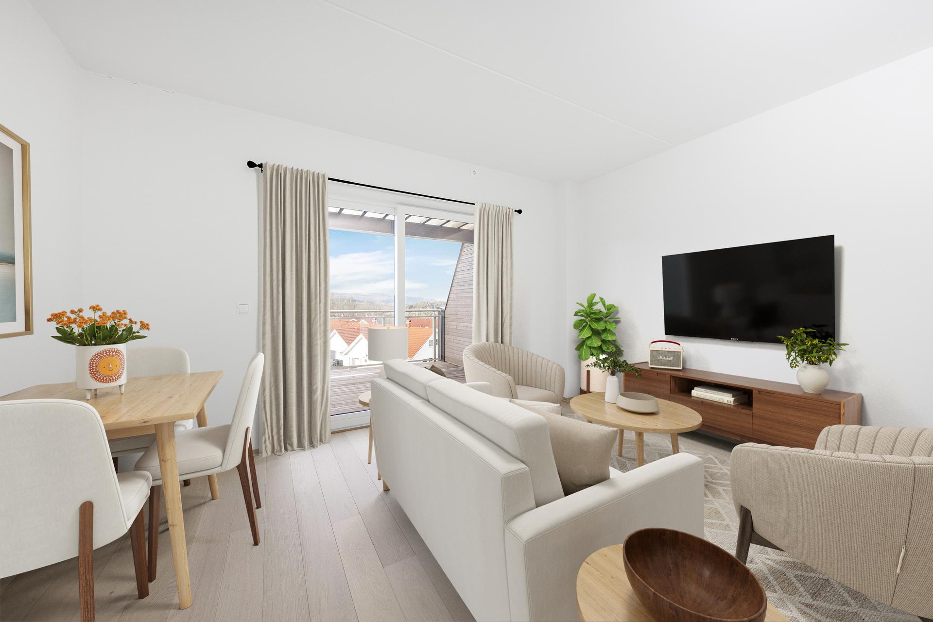 Stor skyvedør mot terrassen, som sikrer mye naturlig lys inn i leiligheten.. Bilde nummer 1 av 3