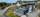 Moderne og innholdsrik hytte med bl. a. 2 bad, 5 soverom og carport. Blomstereng er digitalt redigert, det vil bli sådd denne sommeren. . Bilde nummer 2 av 3