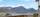 Fra terrassen er det åpen utsikt over Kasfjorden og de omkringliggende fjellene. Bilde nummer 3 av 3