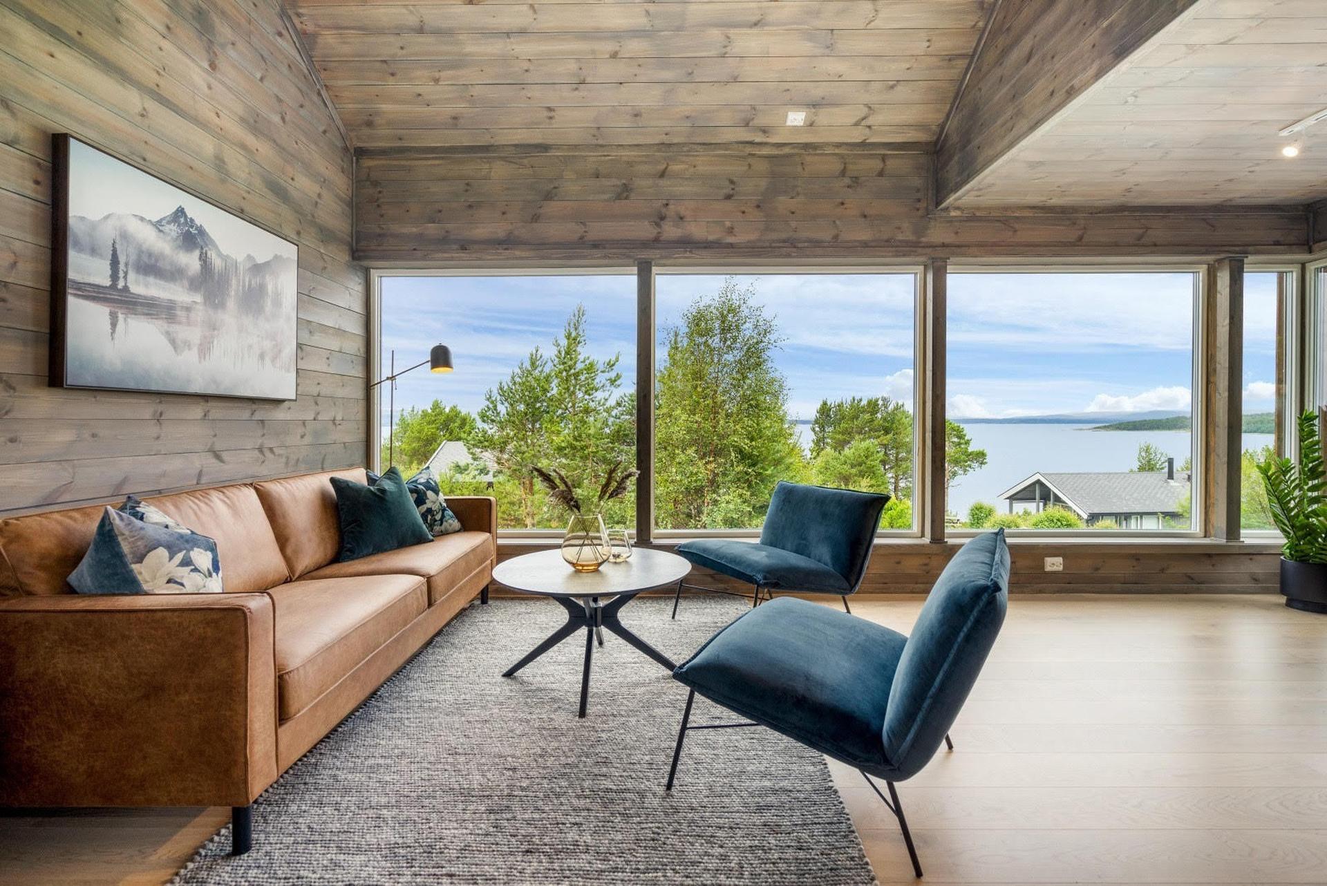 EiendomsMegler 1 v/ Anbjørn Ulseth presenterer Rognlivegen 11. Bilde nummer 1 av 3