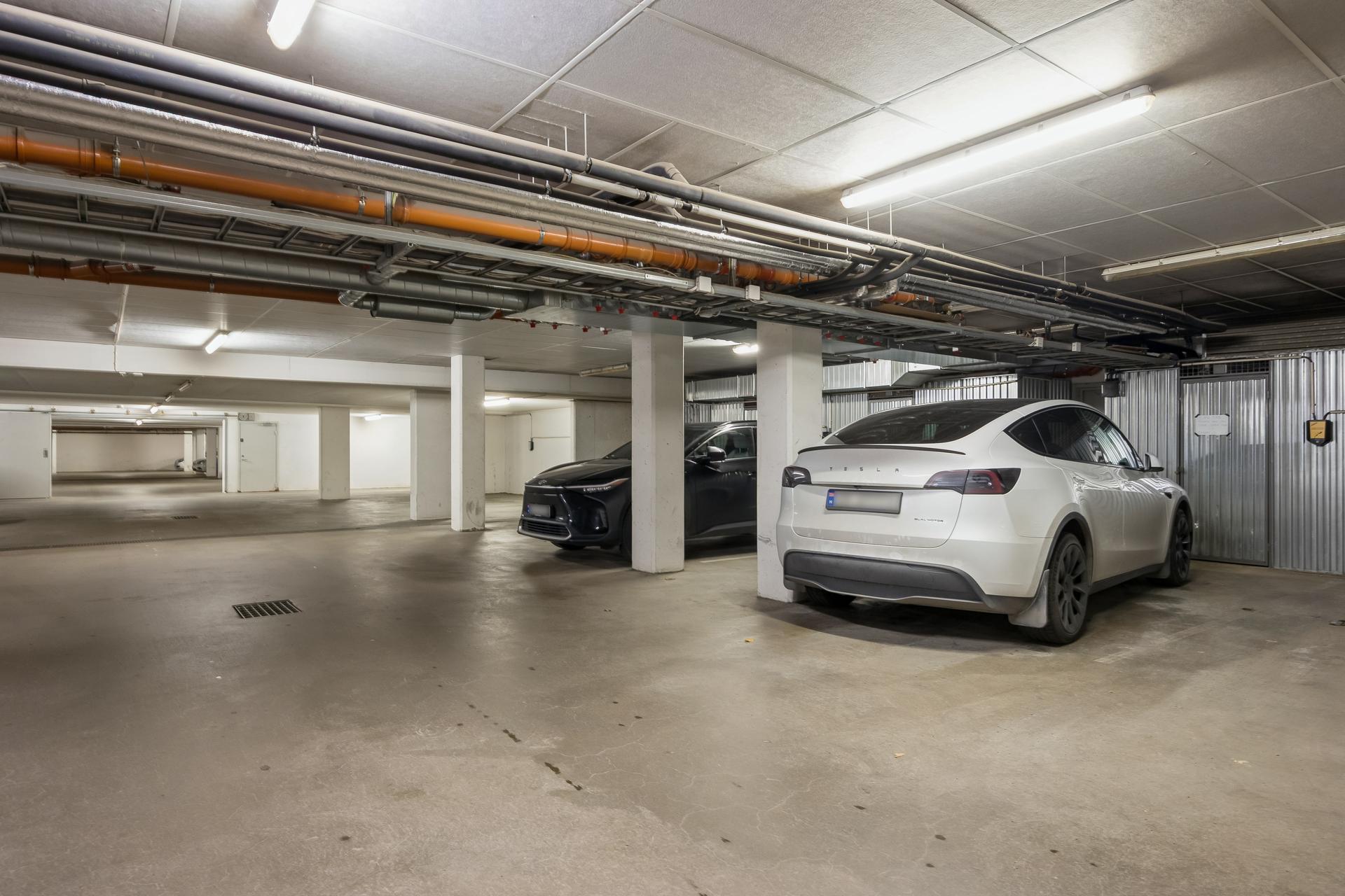 Til hver andel følger rett til bruk av en parkeringsplass.. Bilde nummer 3 av 3