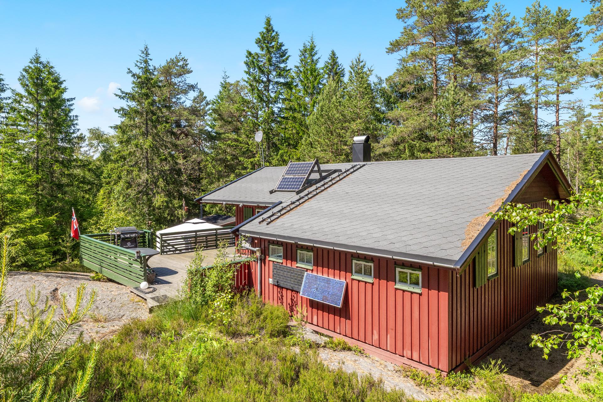 Velkommen til denne sjarmerende fritidsboligen! Foto: Fotoetcetera As  . Bilde nummer 1 av 3