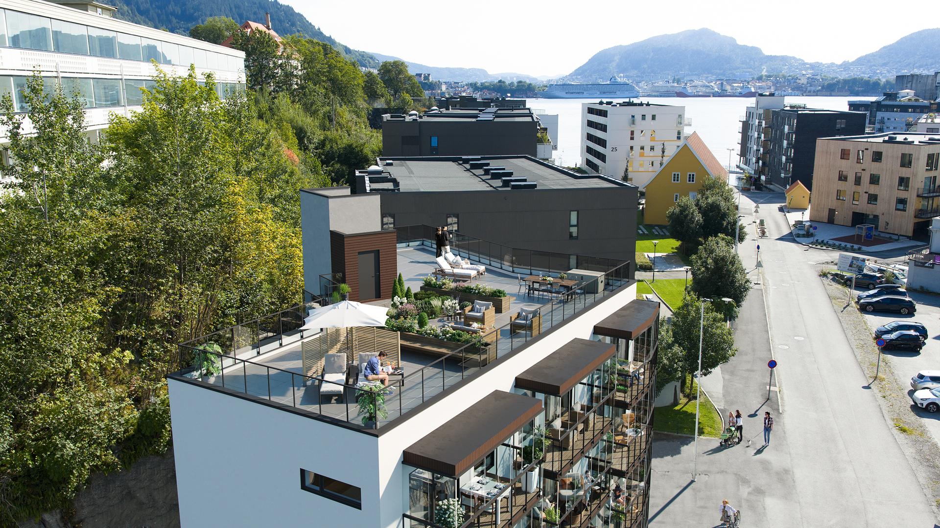 Illustrasjon av felles takterrasse med byfjorden i bakgrunnen. Avvik vil forekomme.. Bilde nummer 3 av 3
